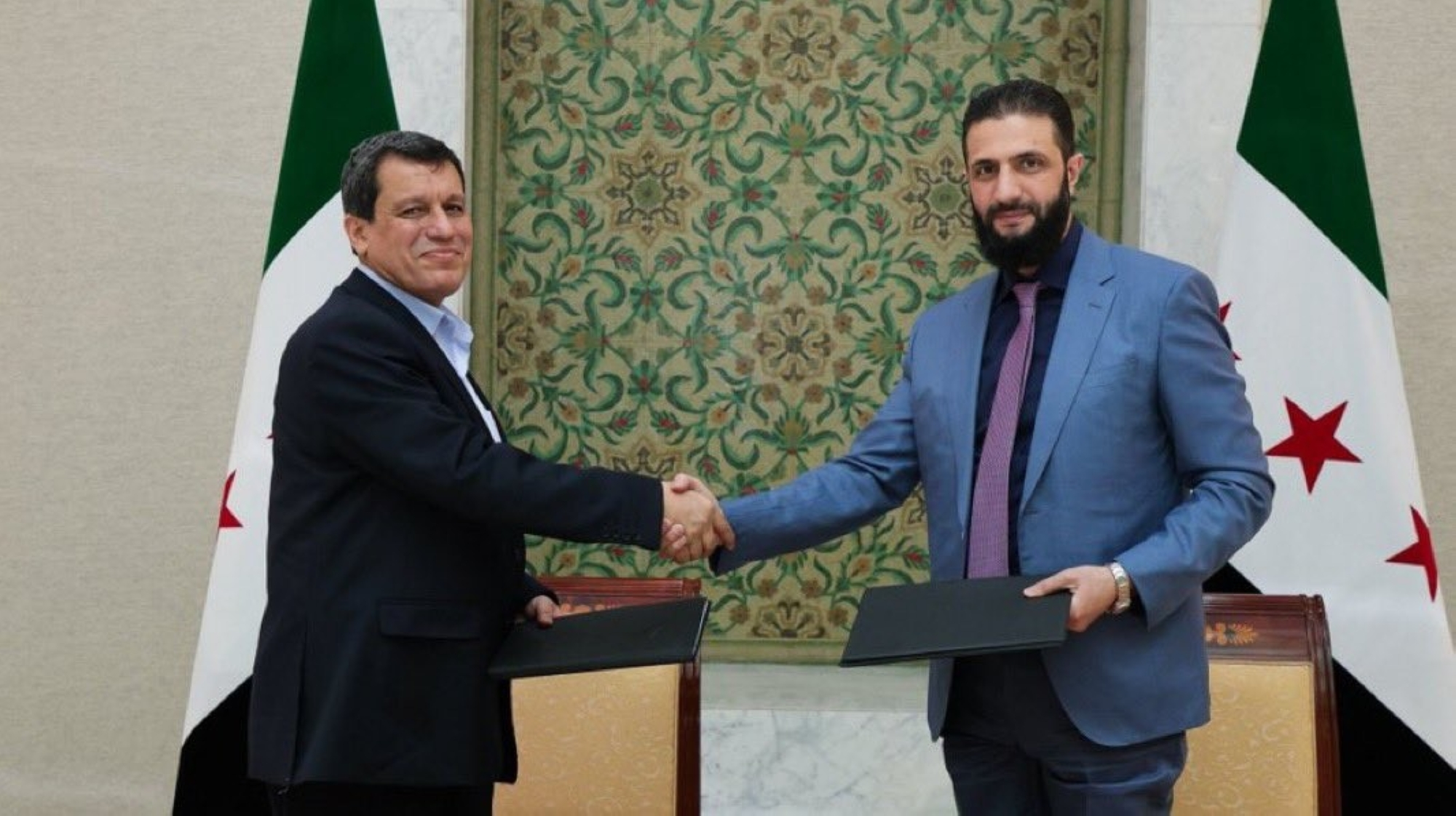 A comprehensive agreement between the Syrian government and the SDF to unify the country